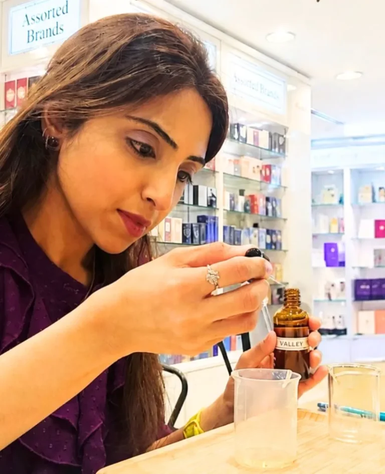 Suman Shafi creating her personalised perfume at a perfume-making workshop
